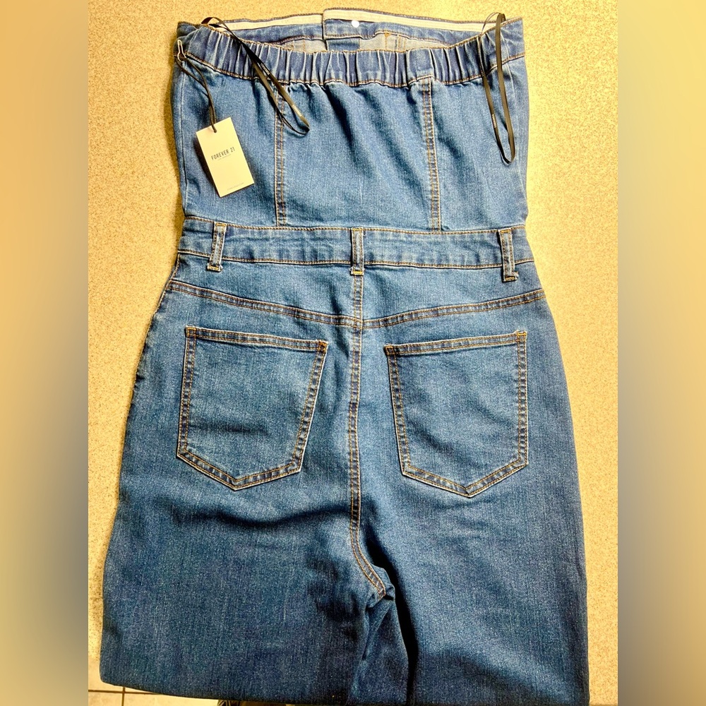 Stretchy Blue Denim Jumpsuit With Silver Buttons And Pockets - Picture 3 of 7